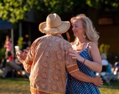 A couple dancing during a concert