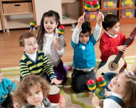 toddlers playing instruments