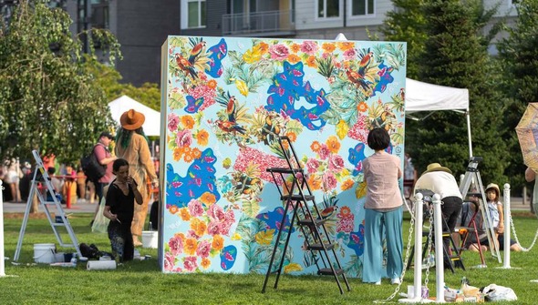 mural getting painted in downtown park