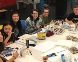 teens making art together