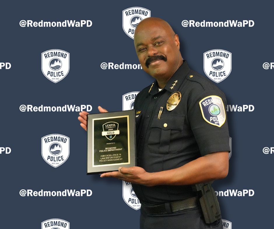 Chief Lowe with Lexipol plaque