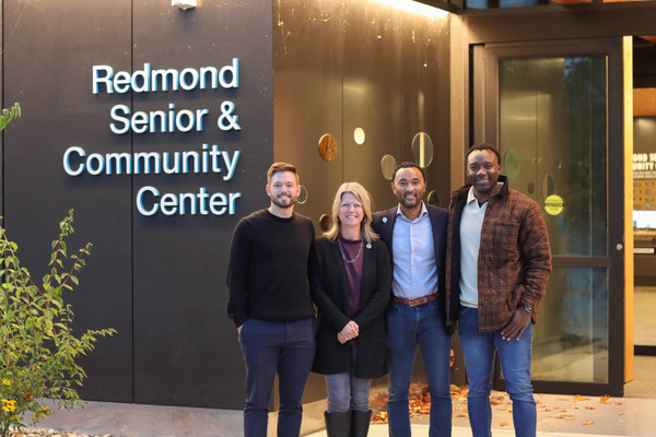 Mayor Birney with Seattle Sounders legends Kelyn Rowe, James Riley, and Jhon Kennedy Hurtado