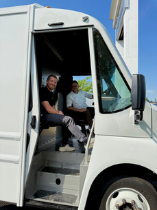 Clean and prosperous staff in truck