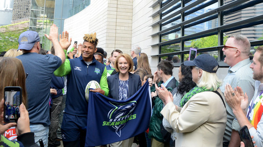 Rugby champions Seattle Seawolves and fans participate in a victory flag raising at City Hall with Mayor Jenny Durkan.