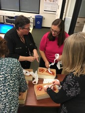 Partcipants learning to pack a wound