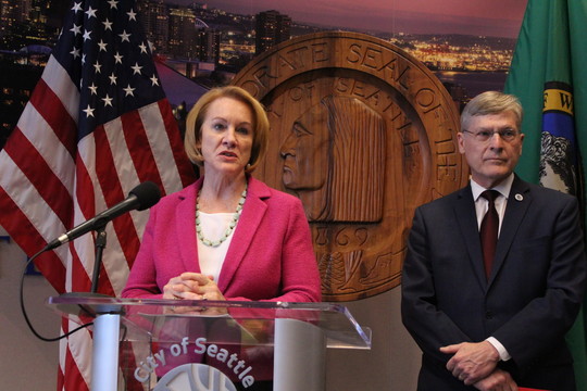 Mayor Durkan and City Attorney Pete Holmes answer questions at the I-976 lawsuit press conference