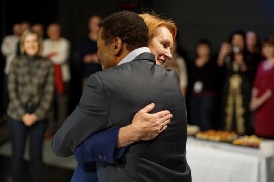 Mayor Durkan and longtime King 5 weatherman Steve Pool share a friendly hug