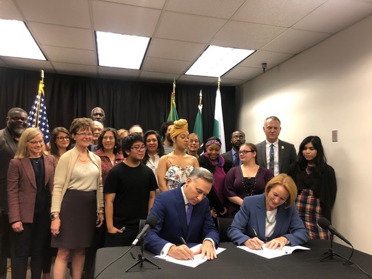 Mayor Durkan and King County Executive Dow Constantine sign the Interlocal Agreement creating a new Regional Homelessness Authority