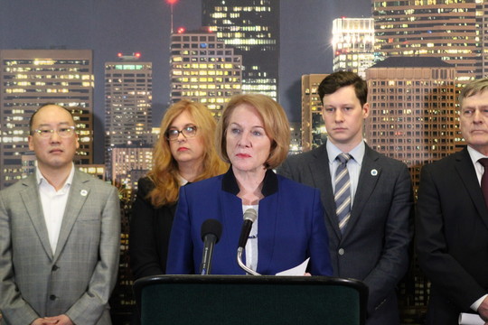 Mayor Durkan stands with City leaders at a public safety briefing at the Seattle Police Department West Precinct