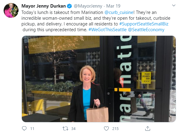 Mayor Durkan poses in front of Marination with lunch in support of #SupportSeattleSmallBiz