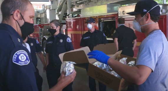 Seattle Mariners' Marco Gonzales delivers sandwiches to firefighters