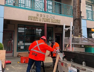 SPU Staff Boarding Up Busiensses
