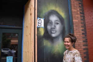 Artist Mari Shibuya working on a portrait of Breonna Taylor, who was 