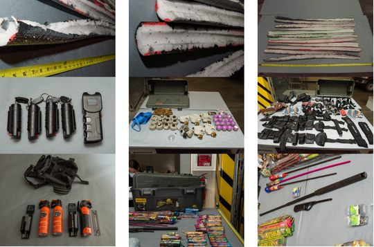 Several photos from SPD crime unit showing undetonated fireworks tied together, improvised spike strips, body armor, gas masks, bear mace, and more