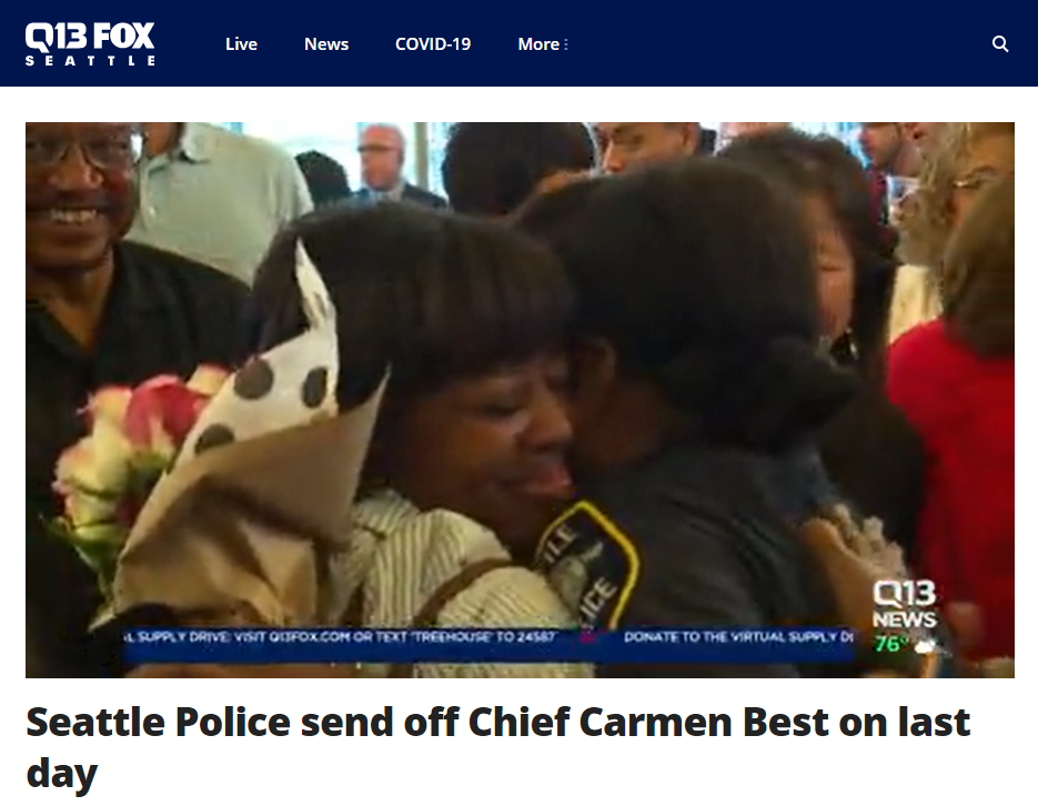 Chief Carmen Best receives a hug from a community member following the press conference where she announced her resignation.