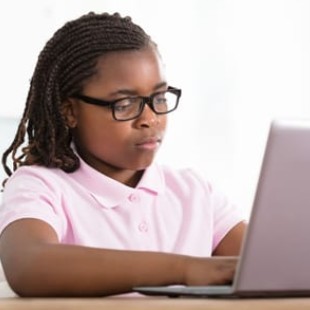 girl working on a laptop