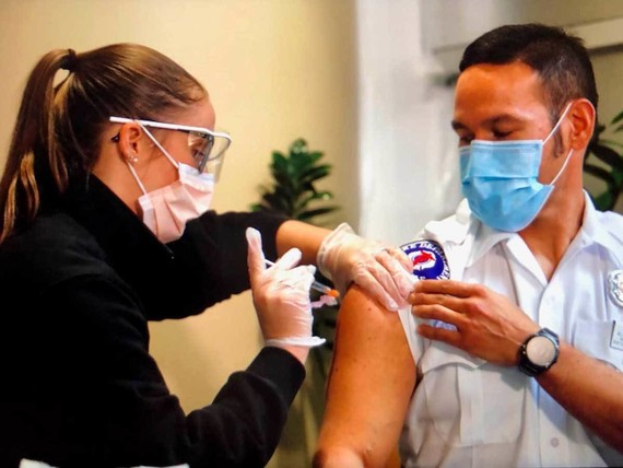 Seattle Firefighters and paramedics receive COVID-19 vaccination