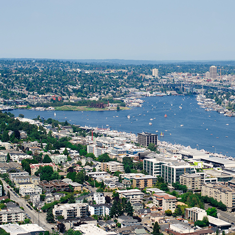 An aerial shot of Lake Union and apartment buildings along the west shoreline.