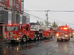 Woman rescued at residential fire