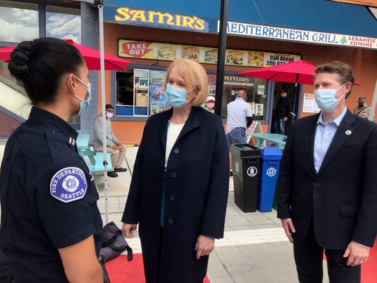 Mayor Durkan with Councilmember Pedersen in the city's U-District