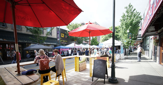 Businesses using outdoor cafes on a street in Seattle