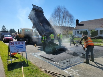 Example of crews in the area working to build speed humps. Please navigate the area with caution and follow all traffic signs 