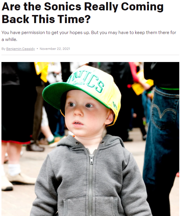 Young kid with a sonics hat on