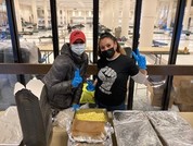 City employees staffing severe weather shelter at Seattle Center's Exhibition Hall in December 2021