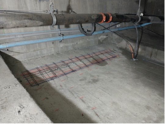 Using GPR scanning, crews locate and mark rebar in the concrete before core drilling 