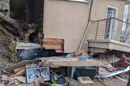 Crews rescue person from collapsed house due to landslide at the 2400 block of Perkins Lane W