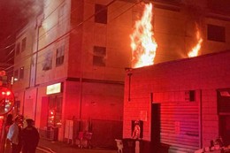 Firefighters rescue man from burning business