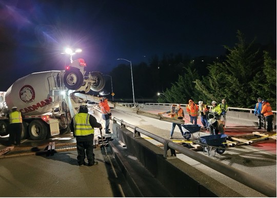 Pouring concrete to install new expansion joints on the bridge. 