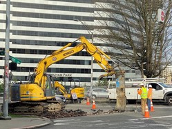 Crews and equipment working at Olive Way