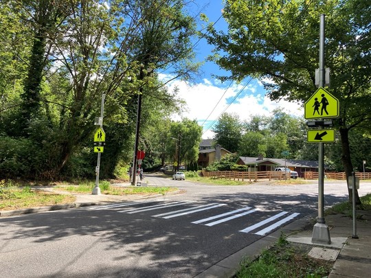 A newly-installed rectangular rapid flashing beacon at a crosswalk at Dumar Way SW and SW Orchard St. Photo: SDOT.