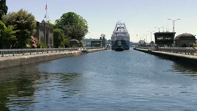 A boat goes through the Ballard Locks