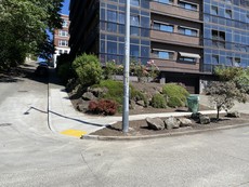 Complete sidewalk and accessible curb ramp at Melrose Avenue and East Roy Street