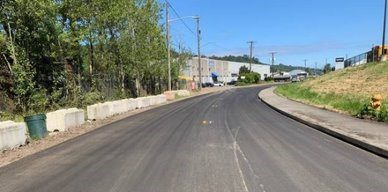 After repaving on Occidental Ave S between S Kenyon St & S Sullivan St.