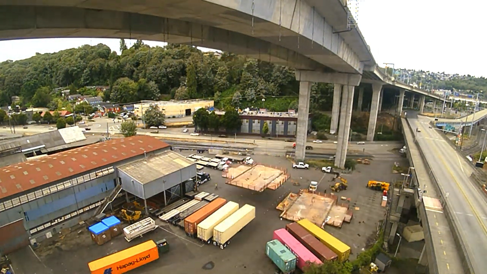 Work platforms being lowered from the West Seattle Bridge on August 20. Photo credit: SDOT.