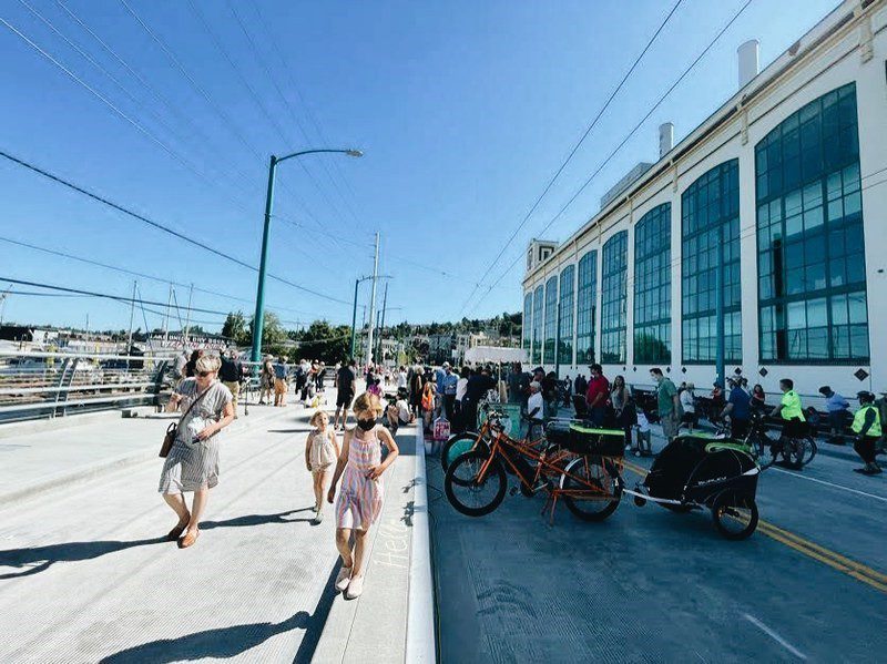 People celebrating the opening of the Fairview Ave N Bridge