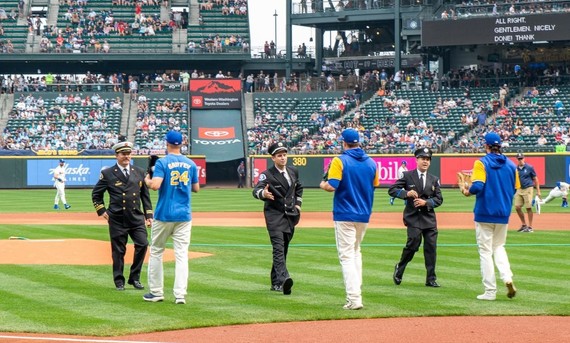 Seattle Fire Chief of the Year, Officer of the Year and Firefighter of the Year threw out the first pitch at the Mariners game on 9/11