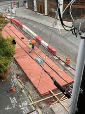 Completed east side of E Pike and Melrose Ave raised intersection