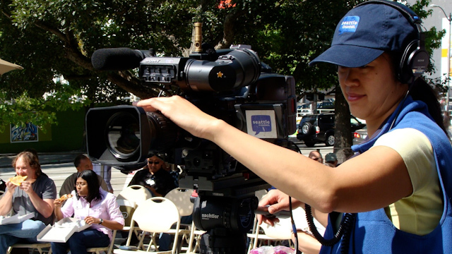 Shannon Gee operates a camera