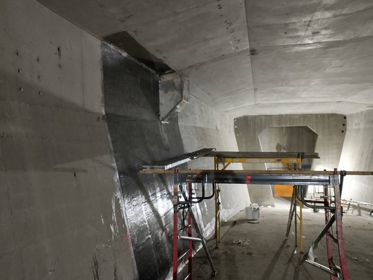We reinforced the interior walls of the bridge’s spans by applying sheets of carbon-fiber wrapping.