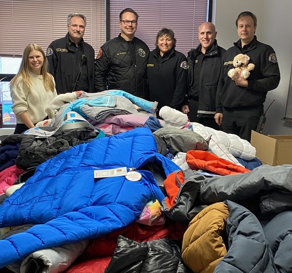 Chiefs from Seattle Fire local 2898 deliver warm coats over the holidays
