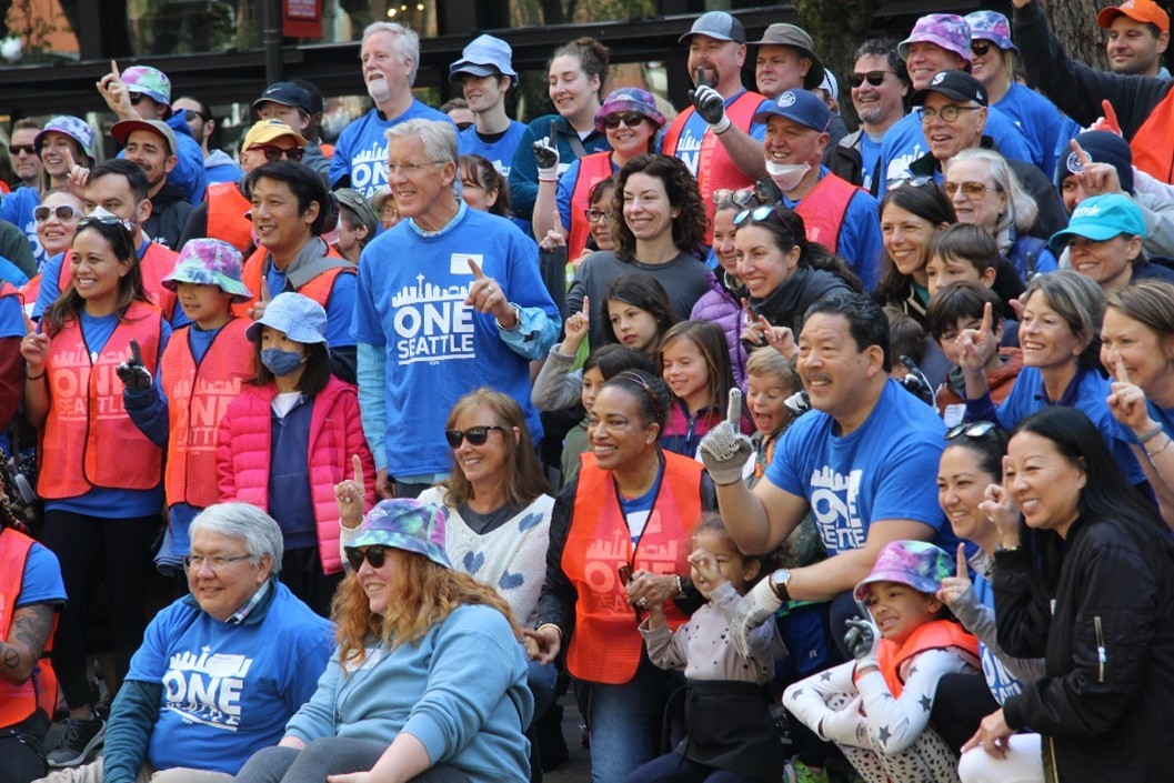 Mayor Harrell joins community members and Seahawks coach Pete Carroll at the One Seattle Day of Service event.