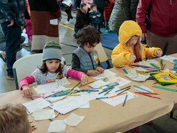 Kids at the arts and crafts table for the Fire Safety Fair at Station 37
