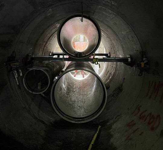 Inside the eight-foot diameter tunnel at the Fremont site, different interior pipes are installed.