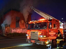 Two-alarm fire in a vacant building on Lake City Way NE