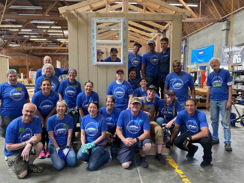Group photo of Seattle Fire personnel that volunteered at Sound Foundations Northwest.