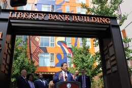 Mayor Harrell speaks outside the Liberty Bank Building